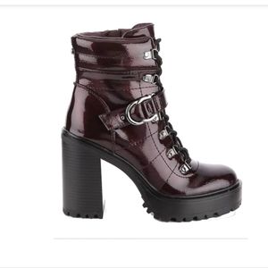 Heeled patent leather boots